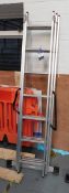 Triple section ladders with base stabilisers