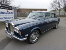 A Rolls Royce Silver Shadow. Registration NEW 627P.