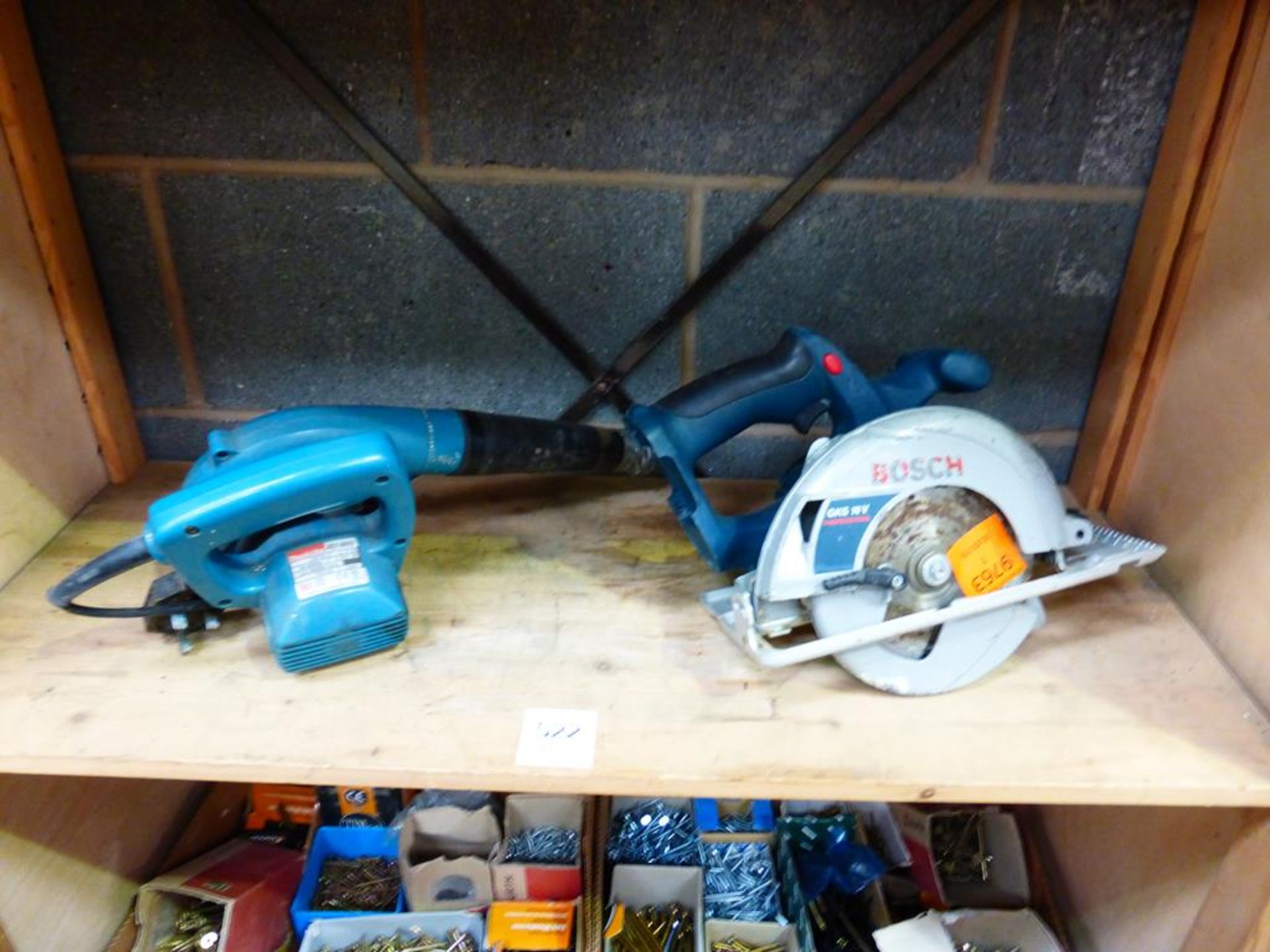 A Makita 4014NV Blower and a Bosch GKS 18V Circular Saw (no battery or charger)