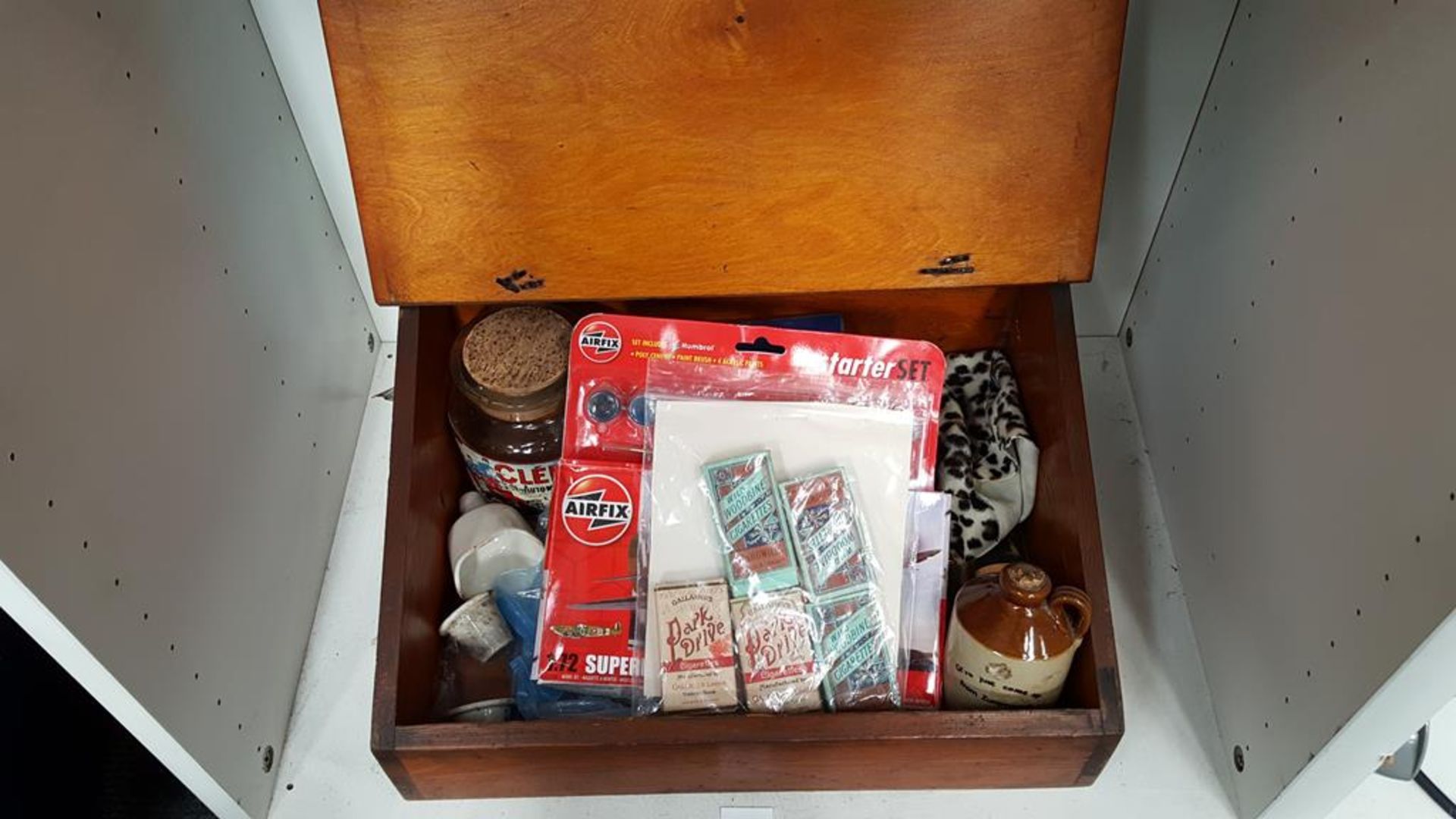 A Wooden Desk with contents to include: Ladies Travelling Vanity Case, Airfix & Spitfire, Ladies
