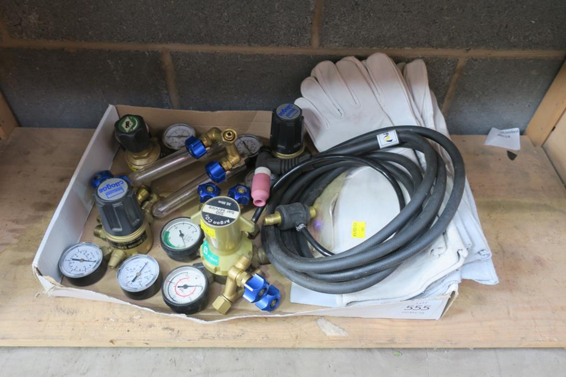 A Selection of Gas Regulators and Welding Gloves