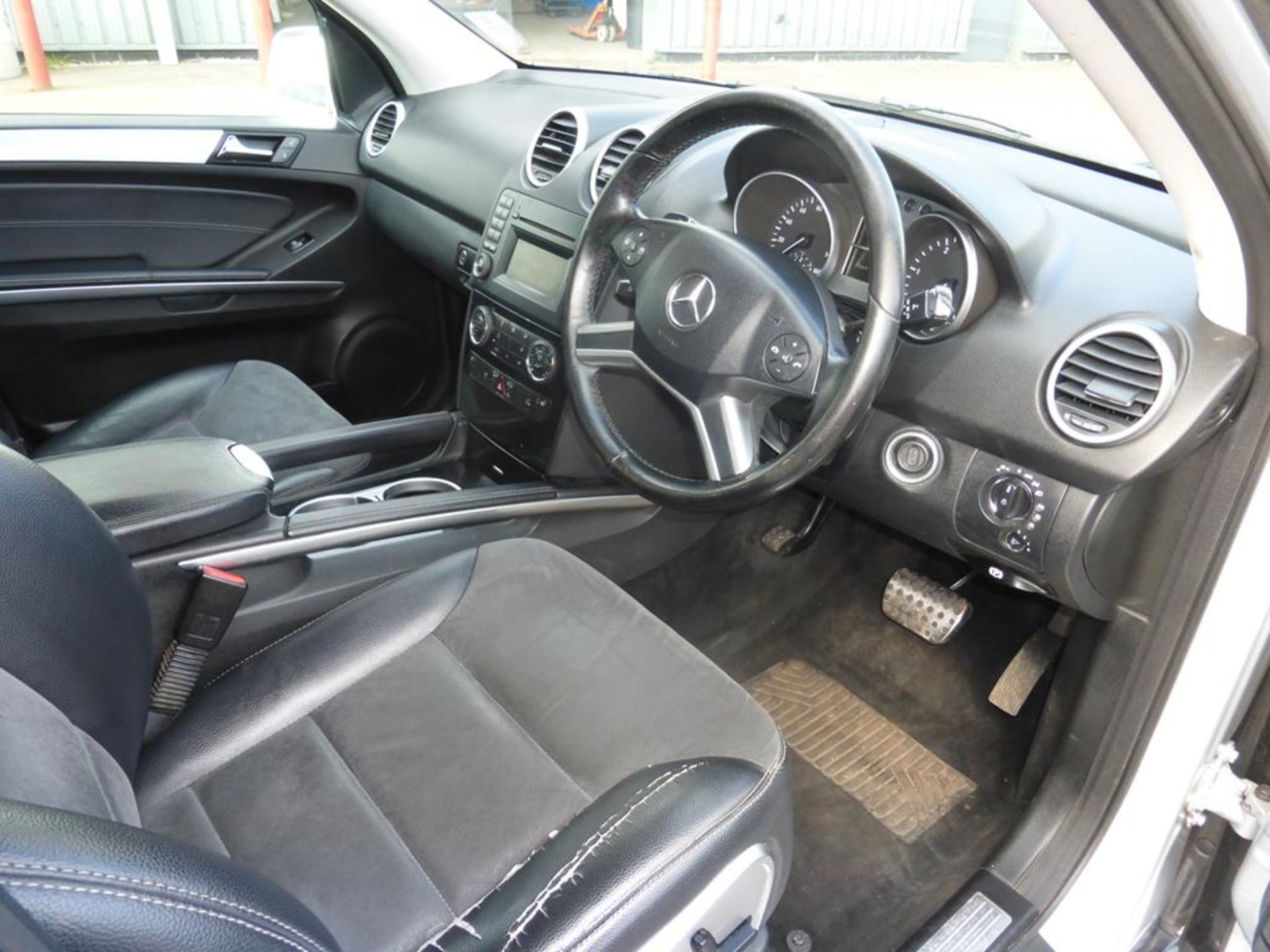 A Mercedes Benz ML 4x4 Half Leather Interior Automatic/Bluetooth and Cruise Control. Date of First - Image 12 of 23