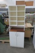 * A Single Storage Unit with 8 compartments to the top and 2 cupboard doors to the bottom. Please
