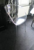 * Contemporary Clear/Plastic/Chrome Chair. This lot is located in Room 201.