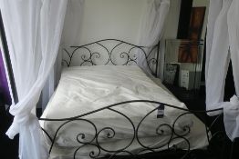 * Ornate Tubular Metal Kingsize 4 Poster Bed with Net Curtains. This lot is located in Room 411.