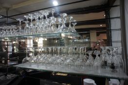 * Glassware and Bar Accessories to Shelf and Bar including Champagne Buckets. This lot is located in