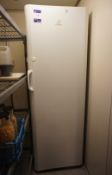 * Indesit Upright Fridge. This lot is located in the Kitchen. Buyers must bring sufficient labour to