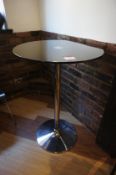 * Glass Topped Chrome Poser Table (700mm Diameter) This lot is located in the Dining Room. Buyers