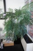 * Large Artificial Potted Plant. This lot is located in the Conservatory