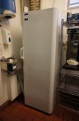 * Indesit Upright Fridge. This lot is located in the Kitchen. Buyers must bring sufficient labour to