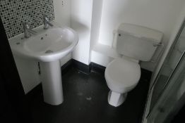 * Bathroom Suite comprising Shower Tray and Screen, Sink on Pedestal and Toilet. This lot is located
