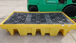 * A Yellow Plastic Bunded Barrel Stand