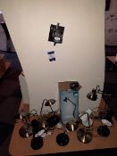 Contents of display wall to include 9 x desk lamps