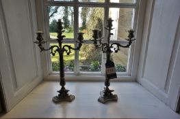 * 2 x Antique Metal Candle Sticks. This lot is located in the Reception Area