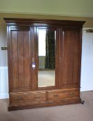 * Large Double Door Oak Effect, Double Drawer Wardrobe with Centre Mirror. This lot is located in