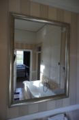* Large Metallic Mirror in bathroom. This lot is located in Bedroom Love
