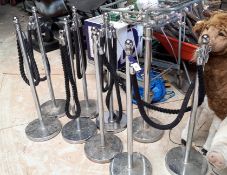 Quantity of brushed steel security posts