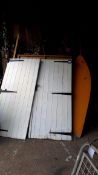 An assortment of wooden display shed panels