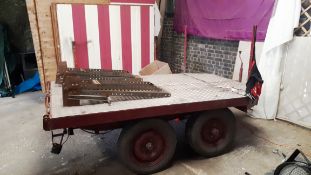 Unbadged twin axle flat bed trailer