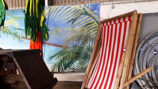 3 x oversized deck chairs with tropical backdrop