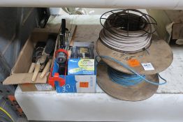 * Reel of Elastic Shock Cord, Nylon Rope on drum, Mastic/Sealant Gun, Height Indicator Plates for