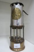 An Authentic Miners Lamp (est £20-£40)