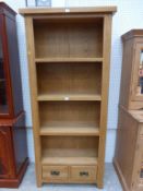 Wooden Open Bookcase with three shelves over two short drawers (H 180cm, W 80cm, D 32cm) (est £40-£