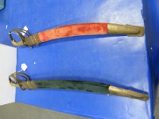 Two Small Indian Made Swords with brass handles in sheaths (est £20-£50)