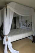 * Metal Framed Four Poster Bed with White Covers and Seventh Heaven Double Mattress. This lot is