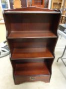 A Book Stand with three shelves and drawer below (H 108cm, W 59cm, D 28cm) (est £20-£40)