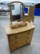Pine Dressing Table Mirror above two short drawers together with a Three Drawer Pine Chest of