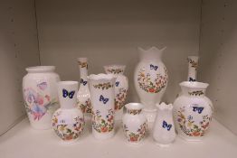 Nine Aynsley 'Cottage Gardens' Vases of various sizes together with a 'Little Sweetheart' Vase (