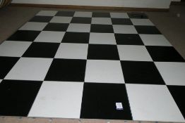 * A Black and White 'Publok' Dance Floor (each square 61cm) approx 62 Sections. This lot is Buyer to