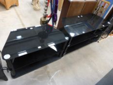 Two 3 tiered Black Glass TV Stands. One H 48cm, W 80cm, D 40cm, the other H 52cm, W 105cm, D