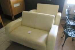 * Two Cream Coloured Two Seat Leather Sofas. This lot is Buyer to Remove. This lot is located at