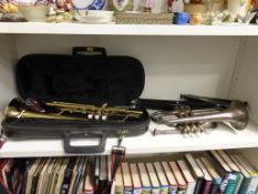 Two Trumpets (one in case) together with a Music Stand (est £25-£50)