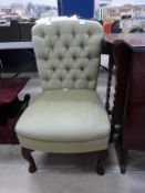 Green Upholstered Nursing Chair on cabriole legs (est £30-£60)
