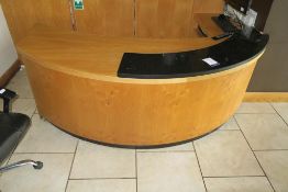 * A Half Moon Reception Desk with a Three Drawer Pedestal, Adjustable Bookcase and Black Faux