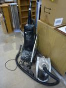 A Hoover Turbo Power 3 Stair Cleaning Vacuum Cleaner together with a Delta CBS 2000 Vacuum
