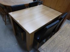 Laminated Wooden Dining Table (H 75cm, W 117cm, D 77cm) together with Four Leatherette Chairs (