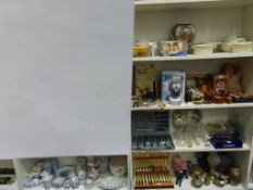 Five Shelves to include Ceramics, Watches, Carving Set etc. (est £20-£40)