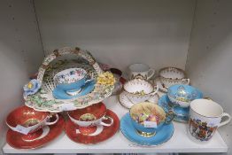 A Shelf containing a Selection of Teacups and Sauces (mostly Aynsley), A Shelley Royal Commemorative