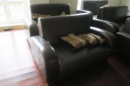 * A Pair of Two Seat Faux Leather Brown Settees with Scatter Cushions. This lot is located at Clough