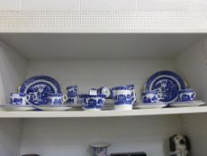 A Shelf containing a Tuscan China Willow Patterned Tea Service including 2 x Sandwich Plates, 1 x