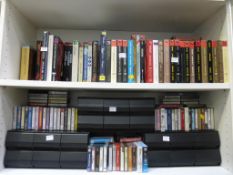 Two Shelves containing Cassettes of Various Genres. Please note the buyer must bring packing