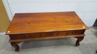 A coffee table with two insert drawers (H51cm, W115cm, D60cm) (est £35-£60)