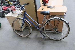 A Claud Butler Classic R-TC Ladies Bicycle complete with lights and basket and mud guards.