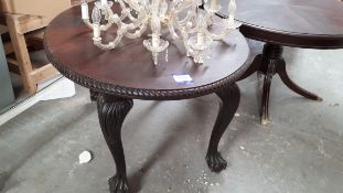 Late Victorian small oval dining table, on claw and ball feet