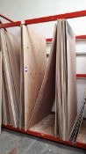 Assortment of wooden sheets and boards to rack