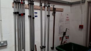 Assortment of clamps to wall